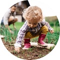 Child playing in garden